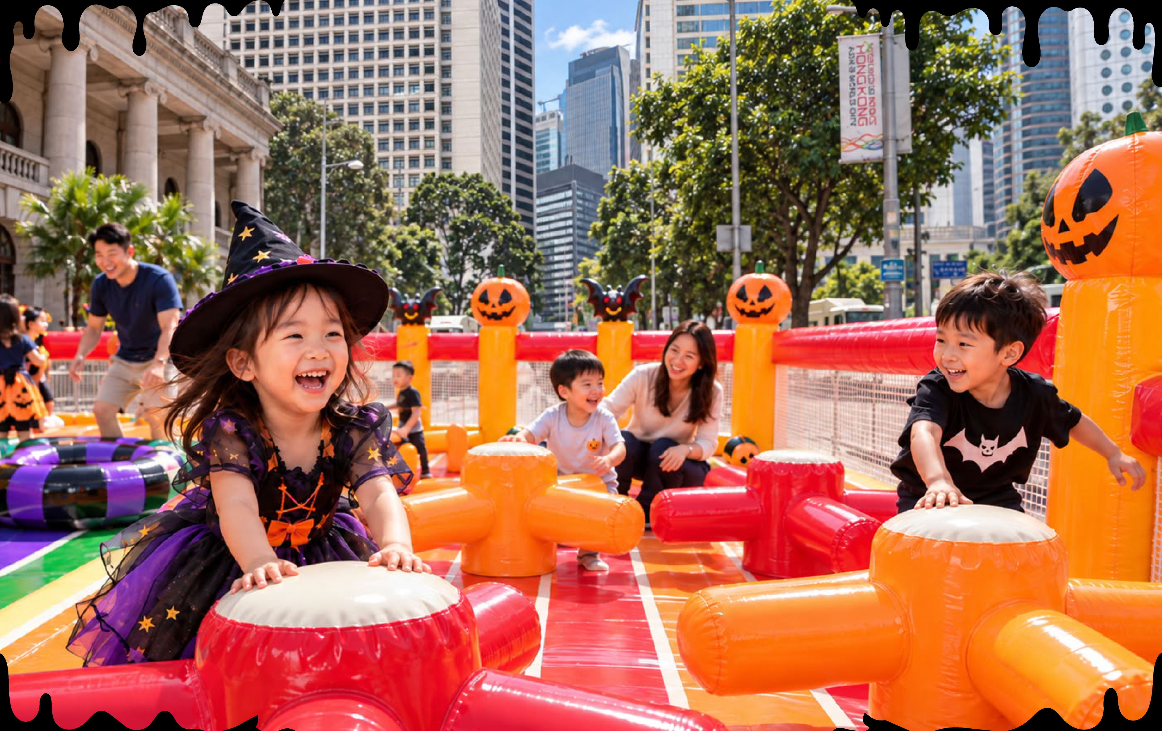 Children enjoying the Halloween inflatable playground in Central